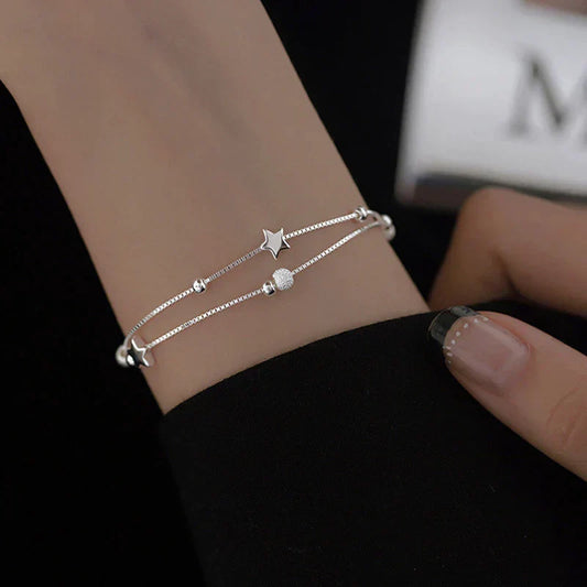 Elegantes Silberarmband mit zauberhaften Sternen